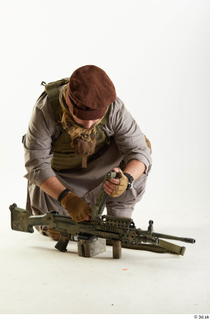 Photos Luis Donovan Army Taliban Gunner Poses charging gun kneeling…